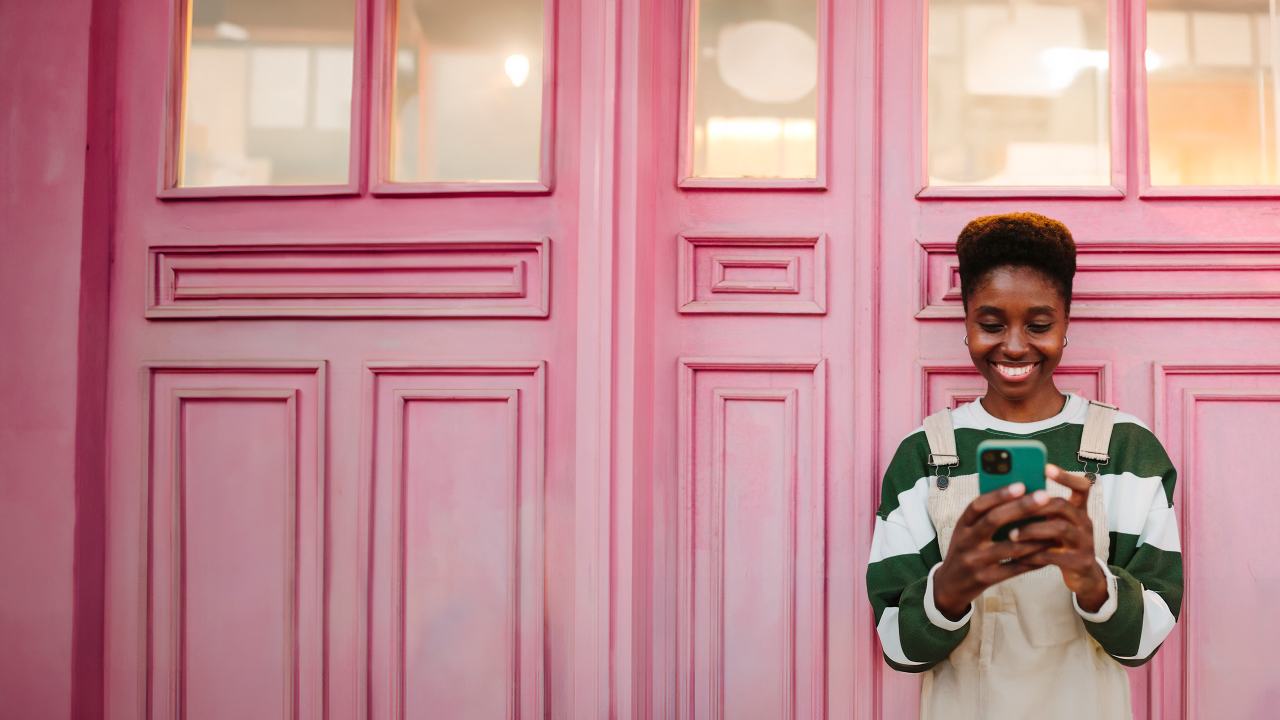 woman typing on a smartphone