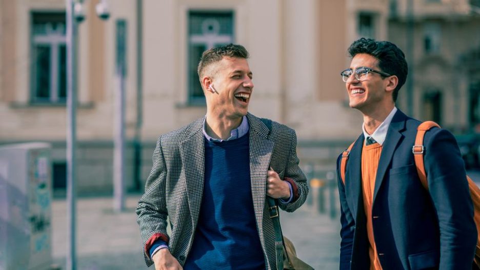young men laughing outside